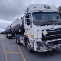 Fleet of trucks carrying freight - NickJak Logistics