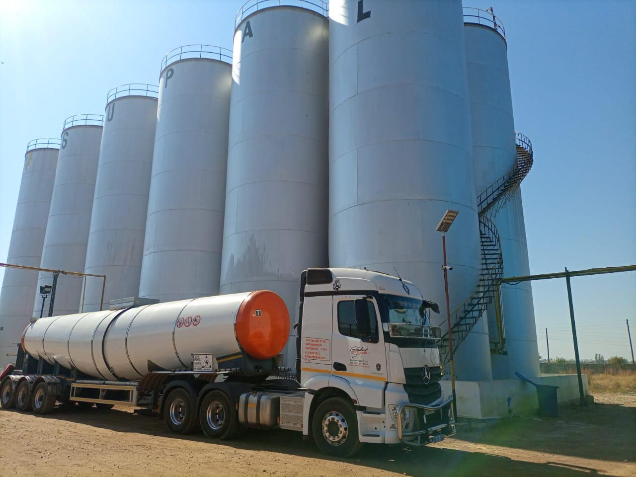 Fleet of trucks carrying freight - NickJak Logistics